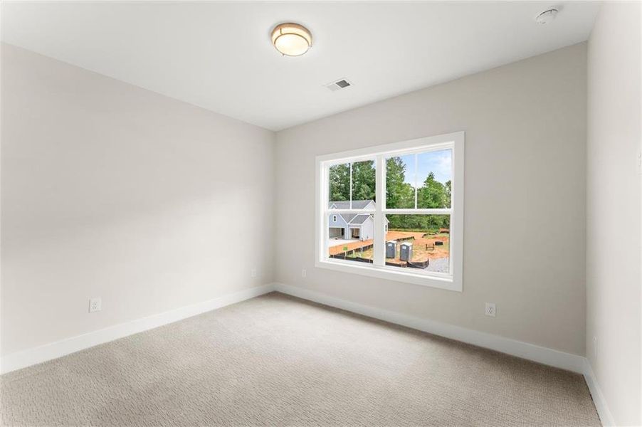 Spacious, unfurnished interior of a new home in Hillgrove Preserve, Powder Springs (Image 57).