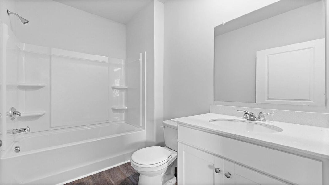 Furnished interior view inside a new home in Pine Hills at Cane Bay, Summerville (Image 7).