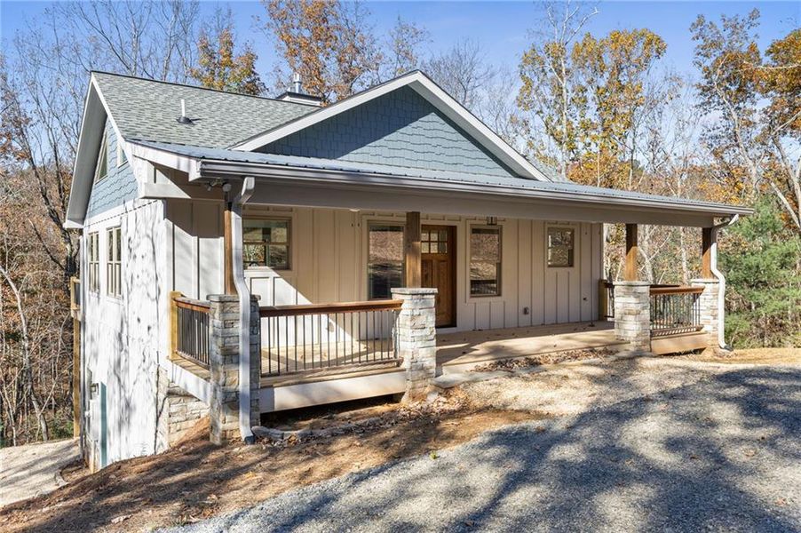 Exterior details and patio area of a home in , Ellijay (Image 21).