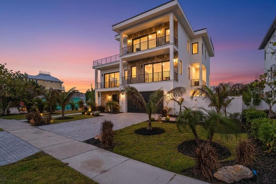 Front exterior of a new home in , Englewood, FL, highlighting curb appeal (Image 29).