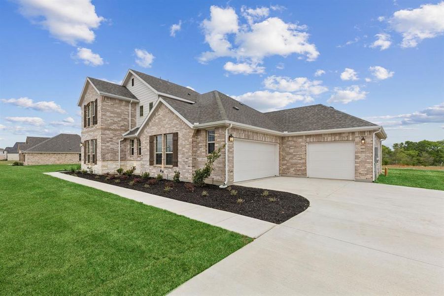 View of front of property with driveway, a garage, roof with shingles, and a front lawn View of front of property with driveway, a garage, roof with shingles, and a front lawn