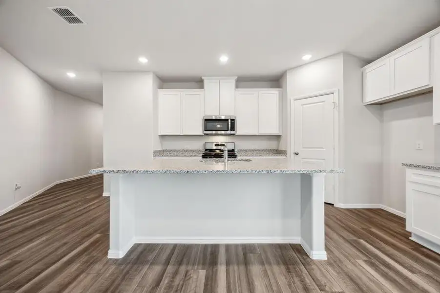Furnished interior view inside a new home in AnaCapri, Anna (Image 5).