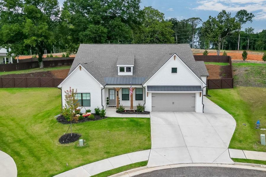 Front exterior of a new home in Rosewood Lake Estates, Hoschton, GA, highlighting curb appeal (Image 2). Front exterior of a new home in Rosewood Lake Estates, Hoschton, GA, highlighting curb appeal (Image 2).