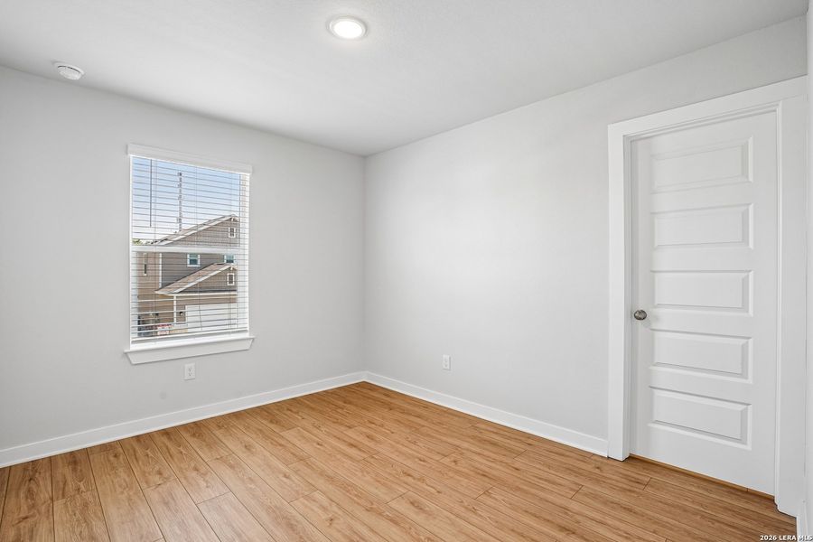 Spacious, unfurnished interior of a new home in University Village, San Antonio (Image 26).