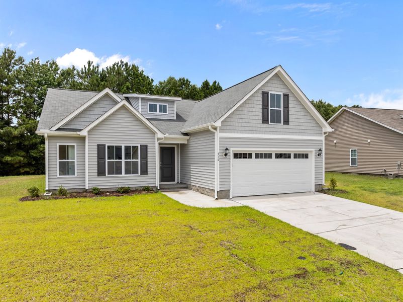 Representative exterior photo of a completed home built from the Westbrook by Bill Clark Homes in Davenport Farms, Winterville, NC (Image 26). Representative exterior photo of a completed home built from the Westbrook by Bill Clark Homes in Davenport Farms, Winterville, NC (Image 26).