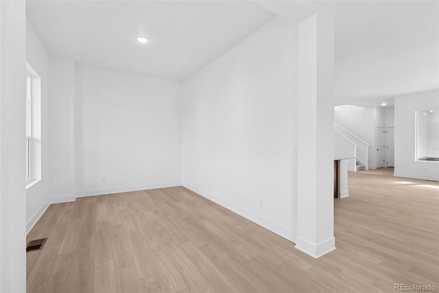 Spacious, unfurnished interior of a new home in Painted Prairie Cottage, Aurora (Image 27).