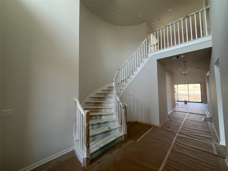 In-progress construction of a new home in Provence, Austin, TX (Image 32).