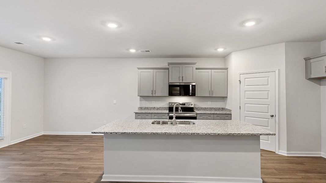 Furnished interior view inside a new home in Southwind Village, Evans (Image 3).