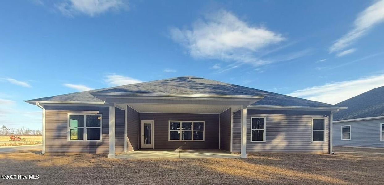Exterior details and patio area of a home in Summer Place, Grimesland (Image 16).