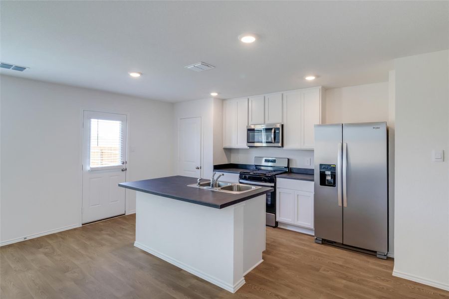 Furnished interior view inside a new home in Prairie Lakes, Buda (Image 6). Furnished interior view inside a new home in Prairie Lakes, Buda (Image 6).