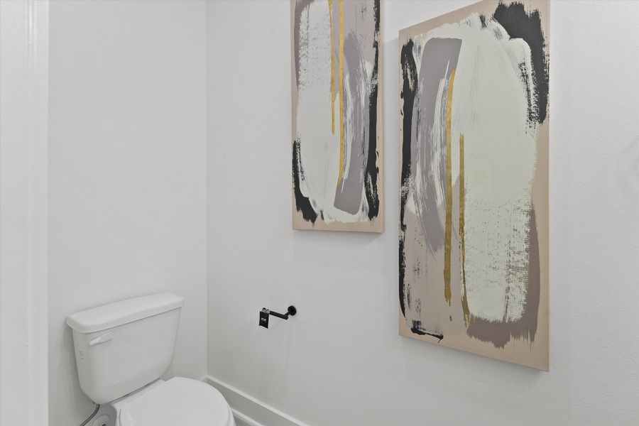 Representative furnished interior of a home built from the 1616 by Zoom Homes in Bauman Landing, Houston (Image 5).