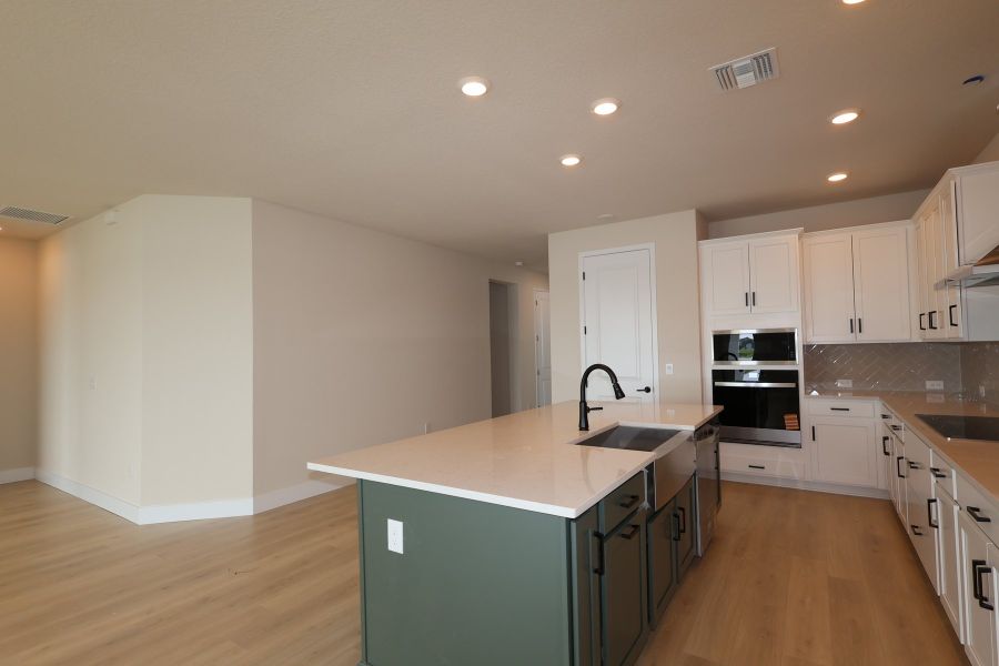 Furnished interior view inside a new home in The Peninsula at Rhodine Lake, Riverview (Image 5).