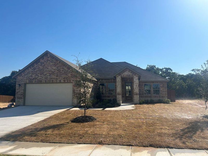 View of front of home featuring a garage