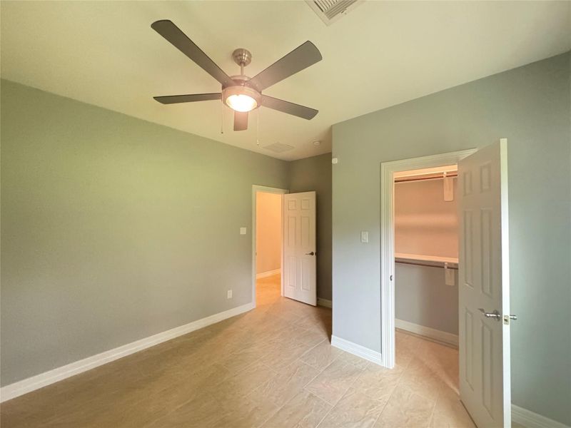 Reverse view of 2nd bedroom with closet