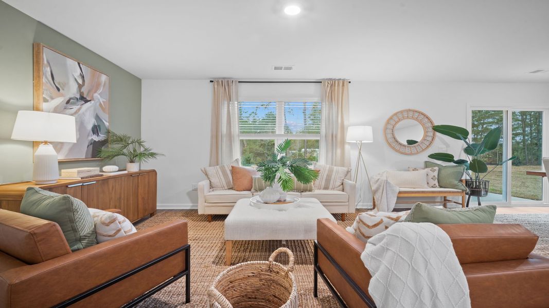 Representative furnished interior of a home built from the Freeport by D.R. Horton in Palm Ridge, Guyton (Image 10).