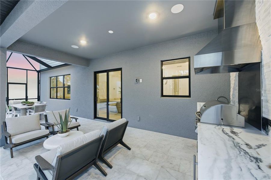 Furnished interior view inside a new home in Grandura, Sarasota (Image 16).