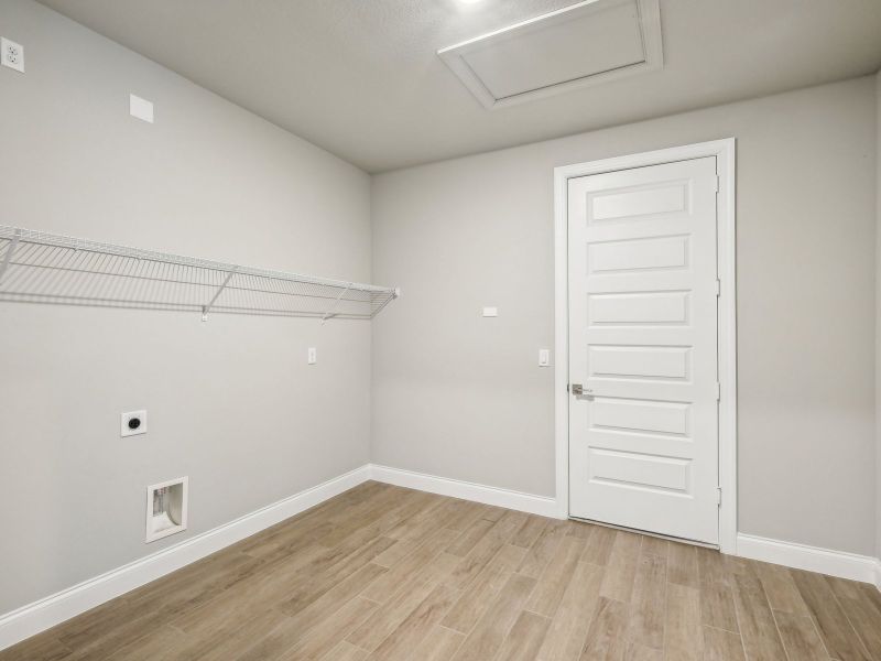 Laundry Room in the Onyx floorplan at 6406 NW Sweetwood Drive