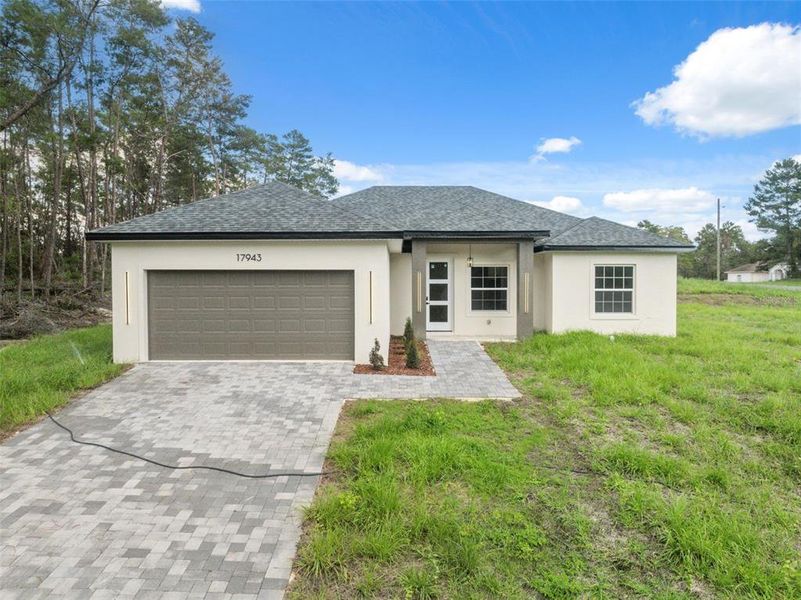 Front exterior of a new home in , Ocala, FL, highlighting curb appeal (Image 21). Front exterior of a new home in , Ocala, FL, highlighting curb appeal (Image 21).