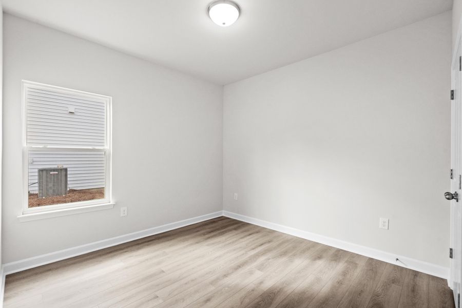 Spacious, unfurnished interior of a new home in Watson Hill, Summerville (Image 13).