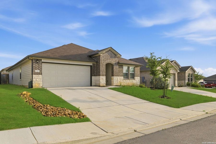 Front exterior of a new home in Arroyo Ranch, Seguin, TX, highlighting curb appeal (Image 19).