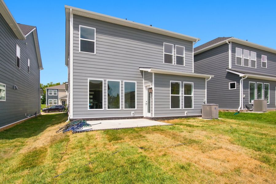 Exterior details and patio area of a home in Nexus – Park Collection, Gallatin (Image 23).