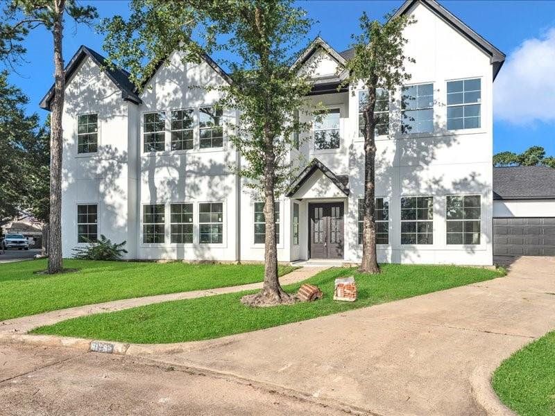 Front exterior of a new home in , Spring, TX, highlighting curb appeal (Image 26). Front exterior of a new home in , Spring, TX, highlighting curb appeal (Image 26).