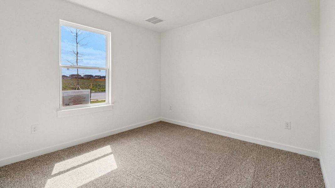 Spacious, unfurnished interior of a new home in Monarch Ranch, Manor (Image 11).