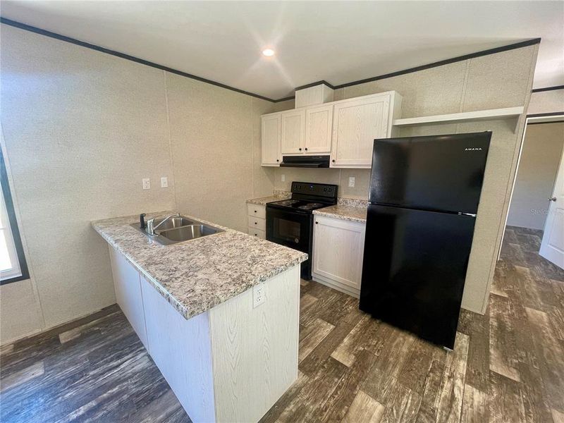 Furnished interior view inside a new home in , Ocala (Image 3).