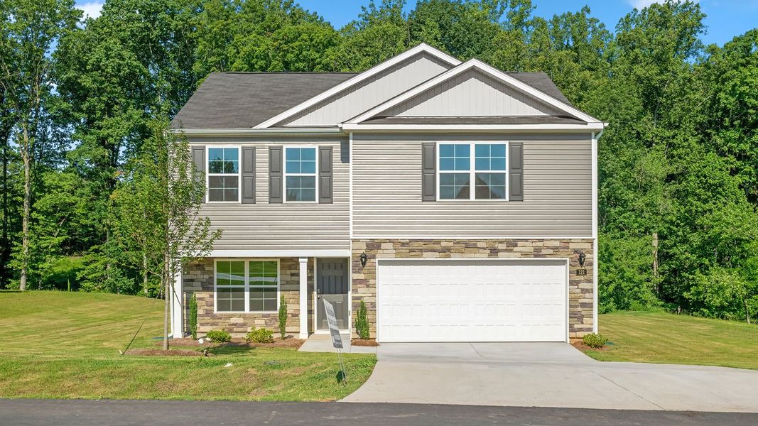 Front exterior of a new home in High Meadows, King, NC, highlighting curb appeal (Image 1).