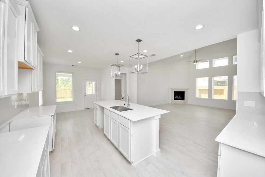 The extended counter area adds both practicality and style, making meal preparation a breeze. Every detail is thoughtfully designed to enhance the kitchen's functionality and aesthetic appeal. The extended counter area adds both practicality and style, making meal preparation a breeze. Every detail is thoughtfully designed to enhance the kitchen's functionality and aesthetic appeal.