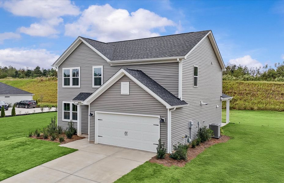 Front exterior of a new home in Sweetwater Hills, Moore, SC, highlighting curb appeal (Image 2).