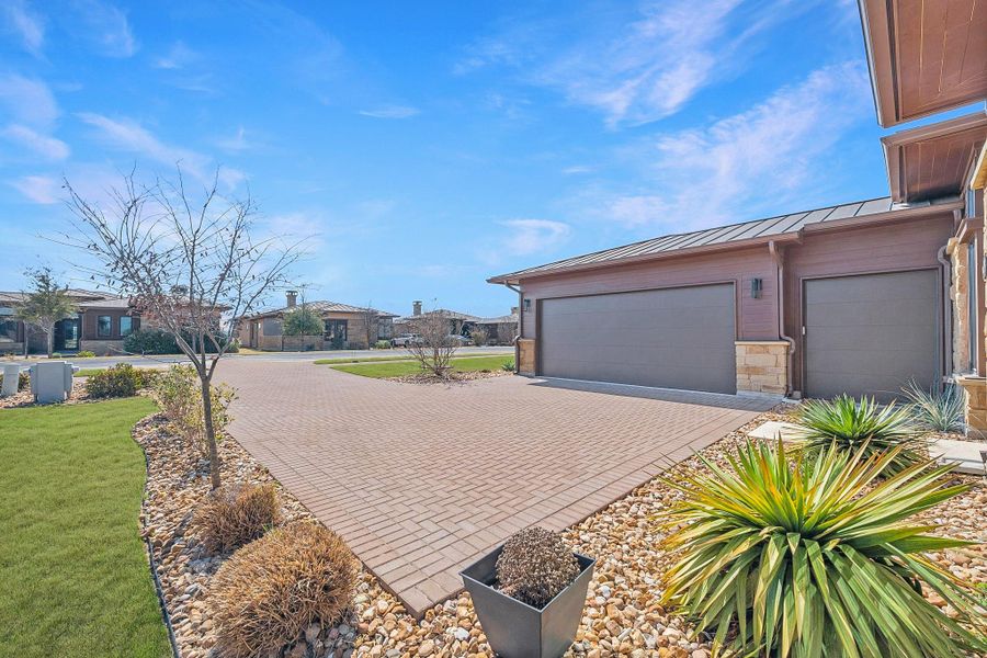 Exterior details and patio area of a home in Lakecliff on Lake Travis, Spicewood (Image 25).
