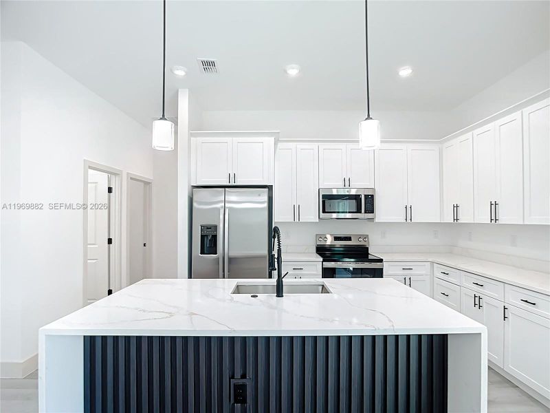 Furnished interior view inside a new home in , Port Charlotte (Image 16).