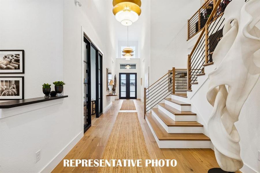 Featuring grand spaces and beautiful finishes, you'll enjoy elevated living in our new Hayden floor plan!  REPRESENTATIVE PHOTO