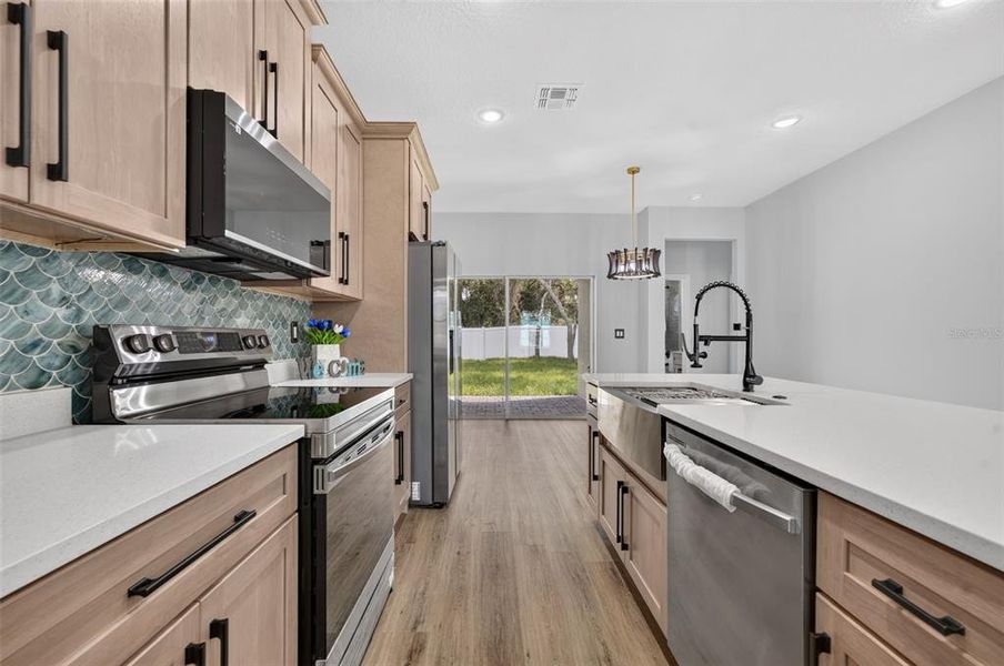 Furnished interior view inside a new home in , Poinciana (Image 28).