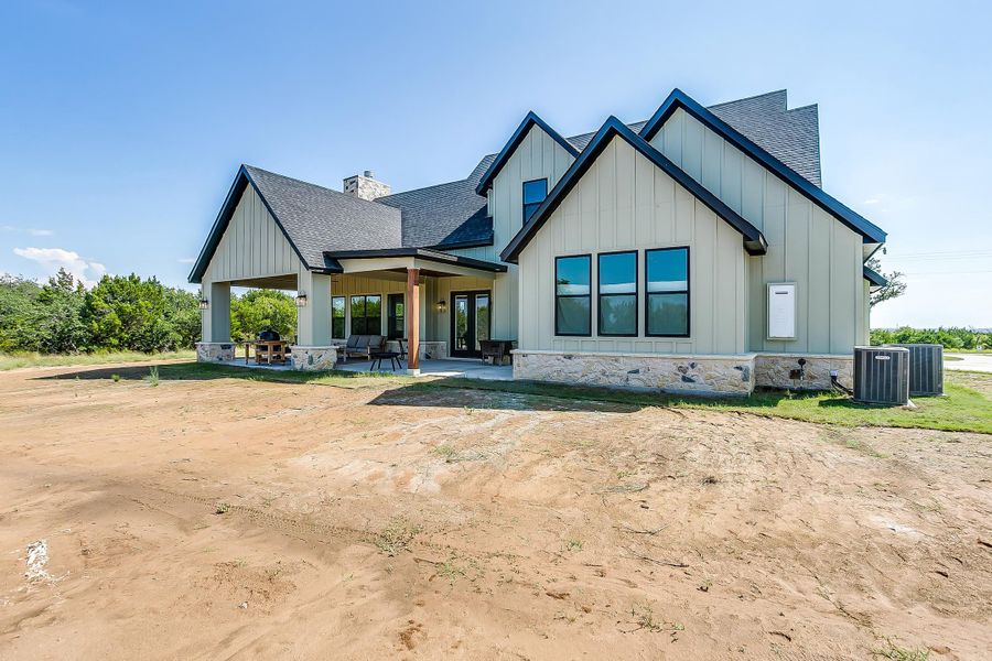 Representative exterior photo of a completed home built from the Rolling Wood by Trinity Classic Homes in Freeman Ranch, Weatherford, TX (Image 15).
