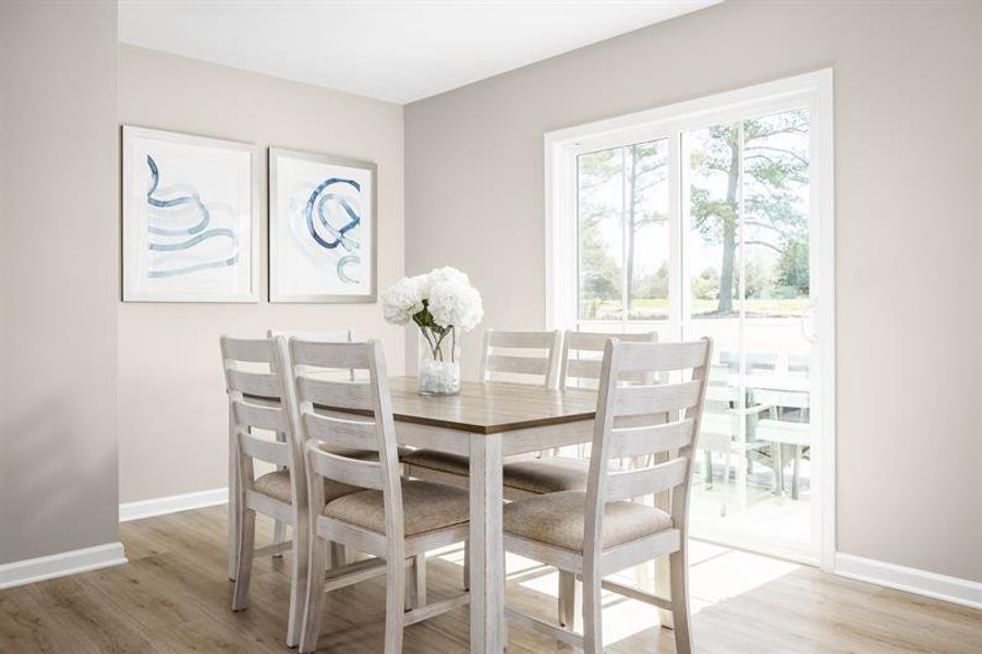 Furnished interior view inside a new home in Wren Woods 2-Story, Gray Court (Image 7). Furnished interior view inside a new home in Wren Woods 2-Story, Gray Court (Image 7).