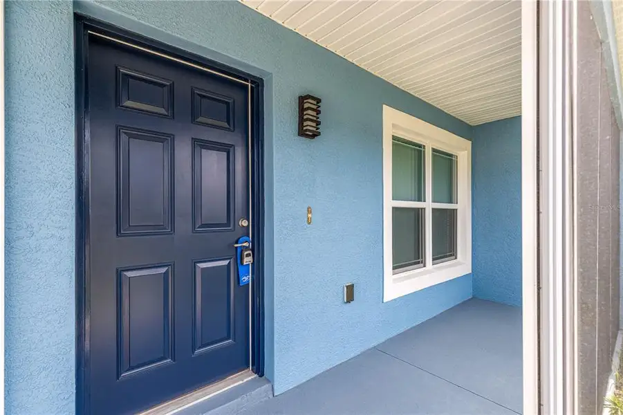Exterior details and patio area of a home in , Ocala (Image 18).