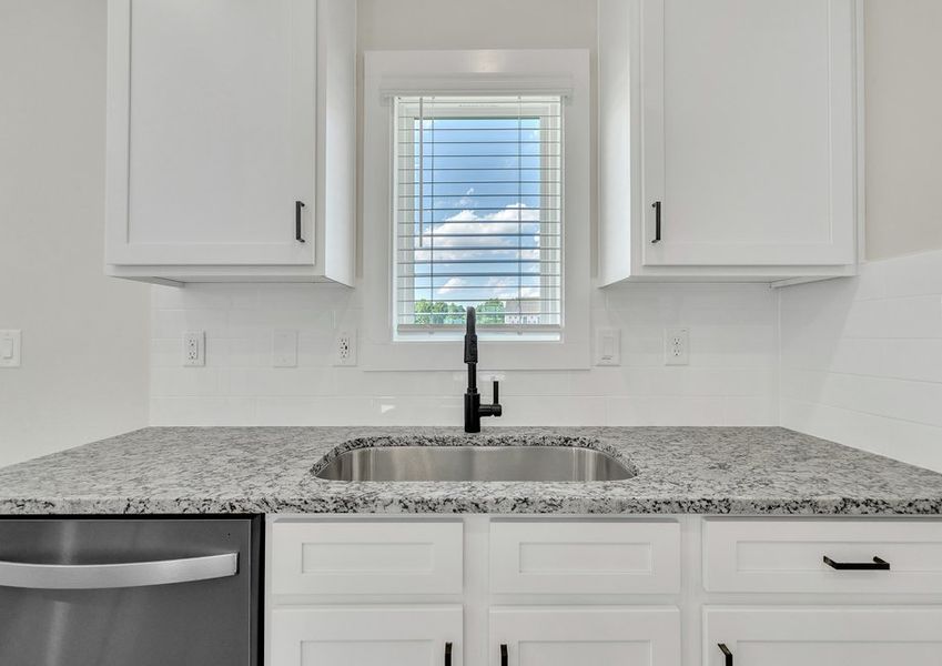 Window over the sink in the kitchen.