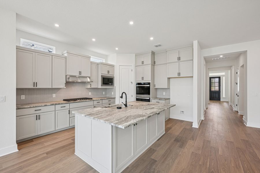 Furnished interior view inside a new home in Persimmon, Buda (Image 6).