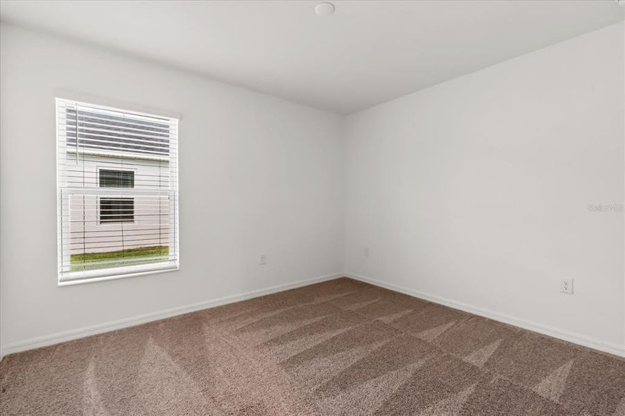 Spacious, unfurnished interior of a new home in Ross Creek, Lakeland (Image 14).