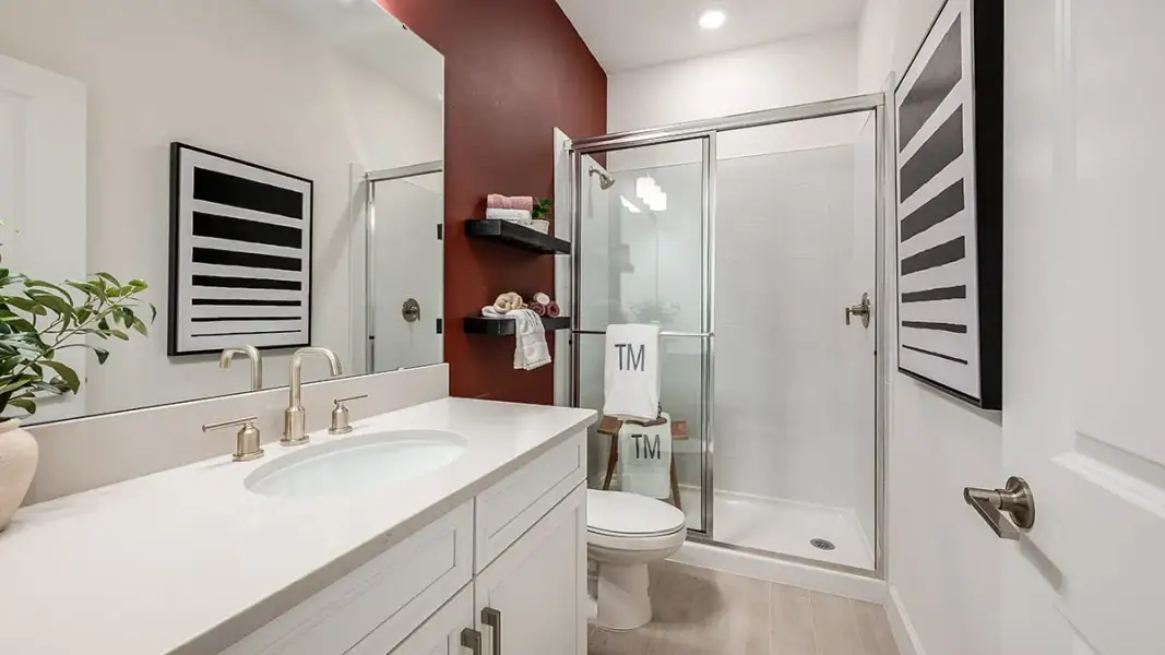 Furnished interior view inside a new home in Esplanade at McKinnon Groves, Winter Garden (Image 11).