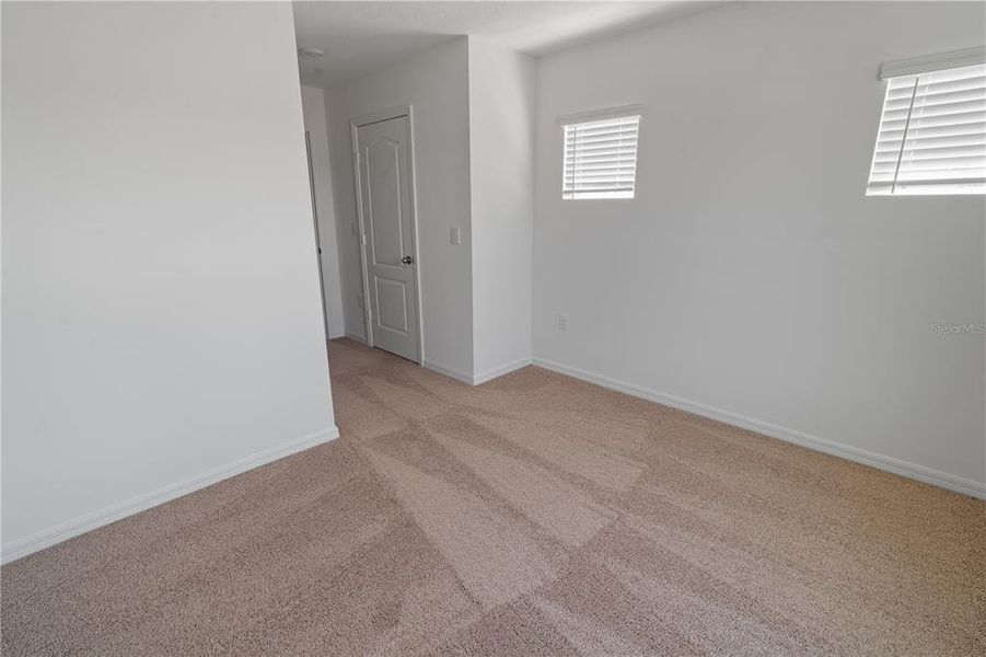 Spacious, unfurnished interior of a new home in Peach Crossings, Winter Haven (Image 20).