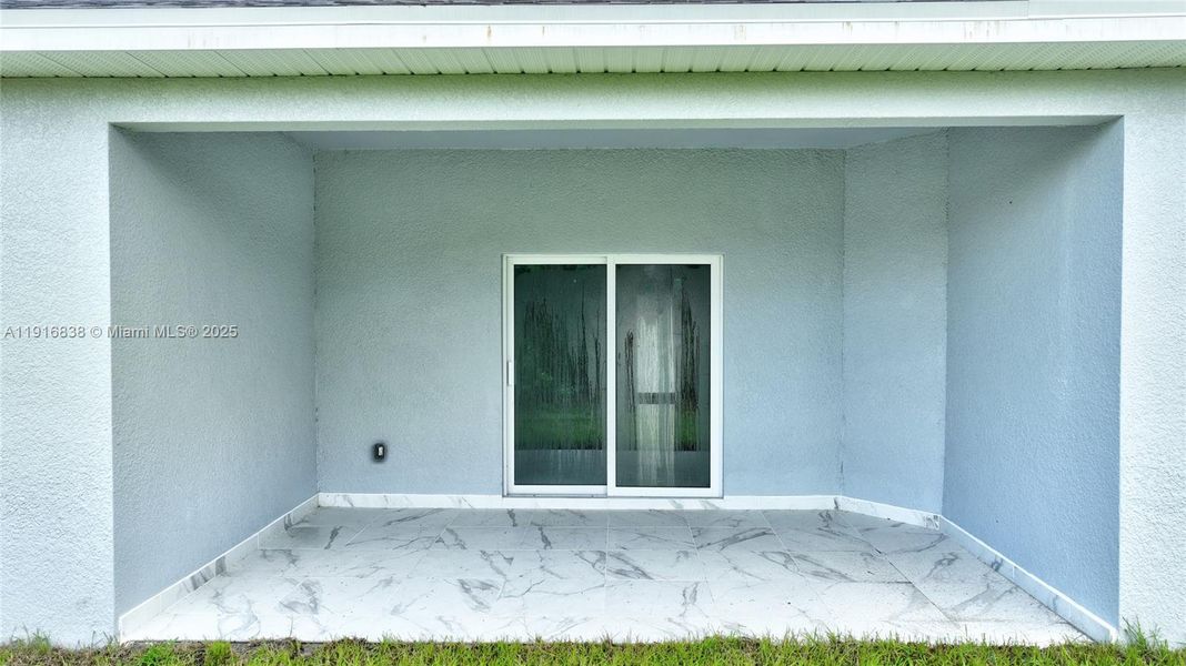 Exterior details and patio area of a home in , Lehigh Acres (Image 22). Exterior details and patio area of a home in , Lehigh Acres (Image 22).
