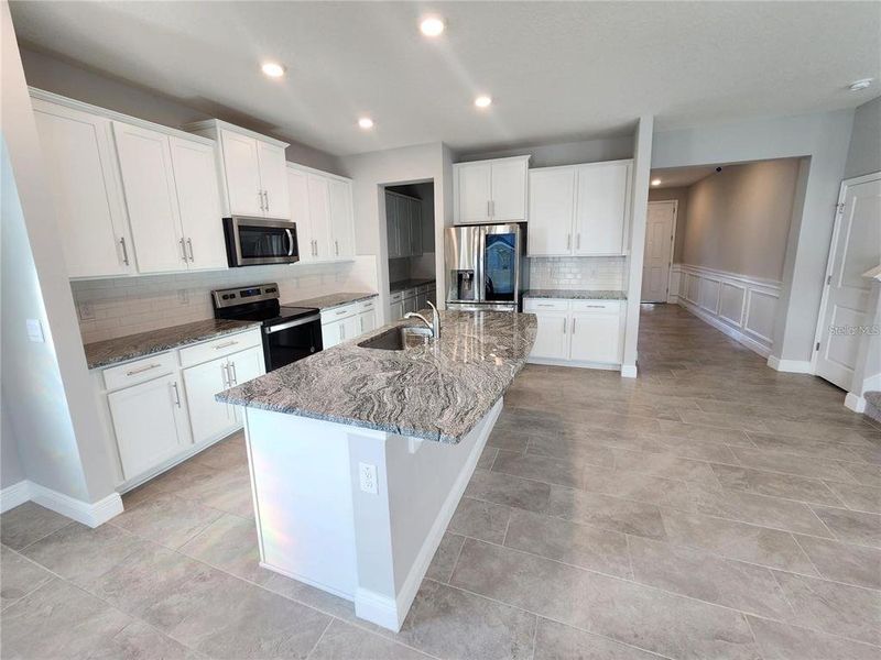 Furnished interior view inside a new home in Woodcreek, Wesley Chapel (Image 5).