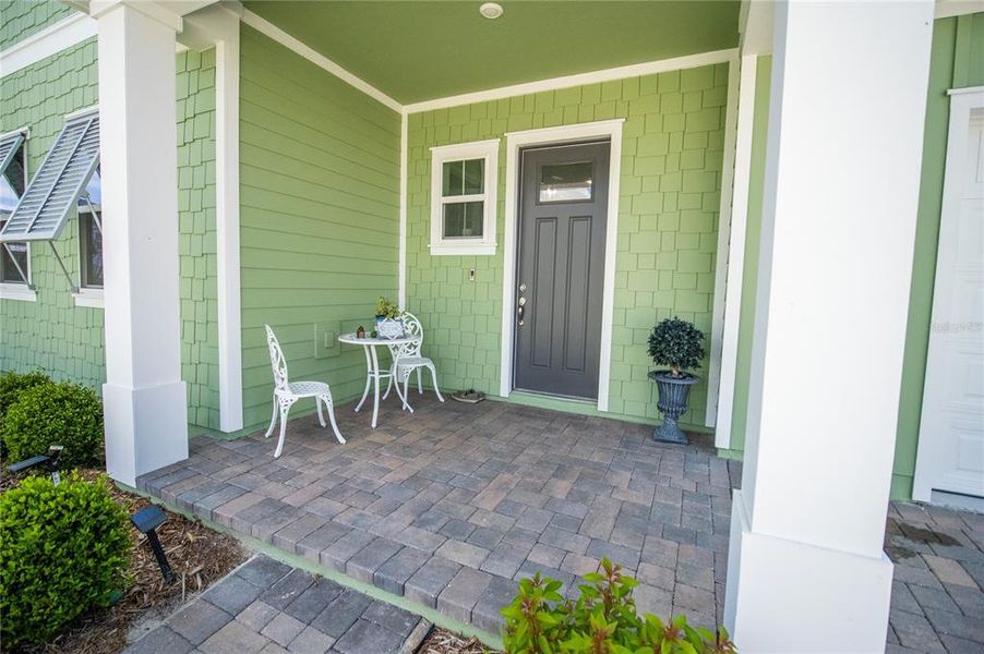 Exterior details and patio area of a home in Weslyn Park at Sunbridge, St. Cloud (Image 30).