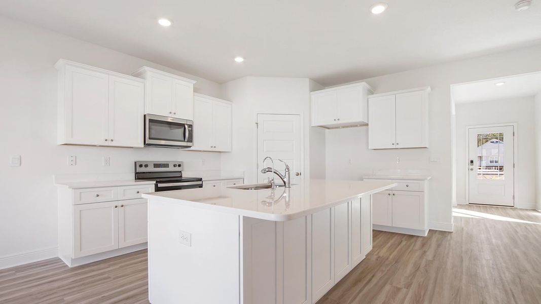 Furnished interior view inside a new home in Bayside at Ward Creek, Panama City Beach (Image 7).