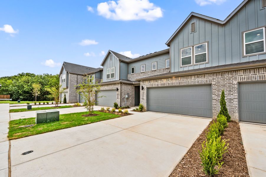 Front exterior of a new home in Enclave at Chadwick Farms, Northlake, TX, highlighting curb appeal (Image 1).