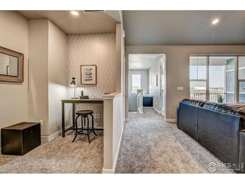 Furnished interior view inside a new home in The Lakes at Centerra - Discovery, Loveland (Image 26).