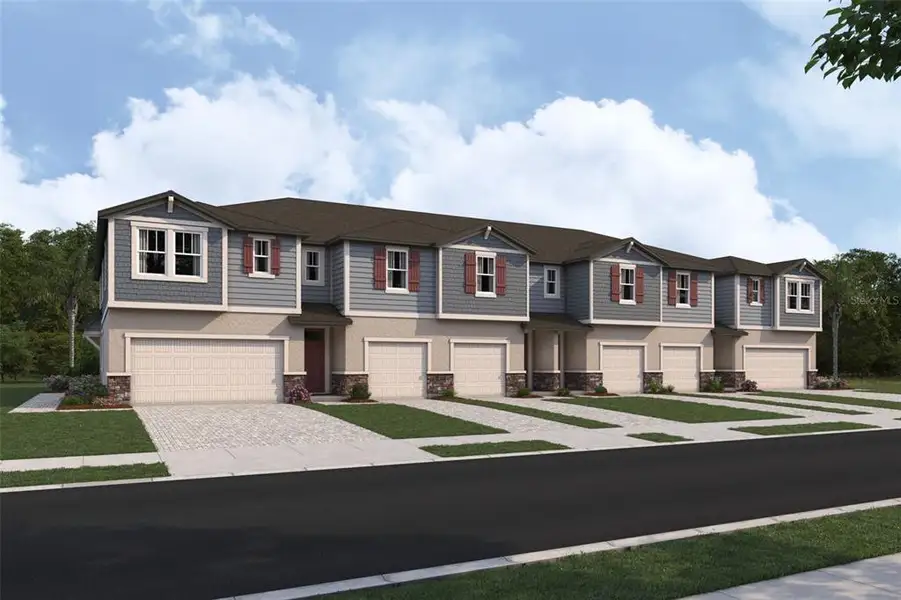 Front exterior of a new home in Crosswind Ranch, Parrish, FL, highlighting curb appeal (Image 1).